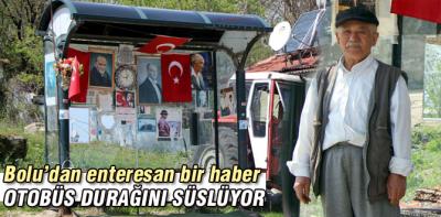 Otobüs durağını güzelleştiriyor