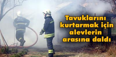 Tavukları için alevlerin arasına daldı