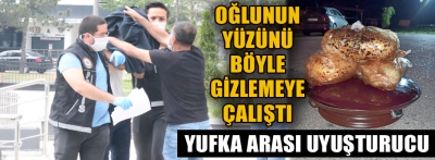 Oğlunun yüzünü böyle gizleme çalıştı