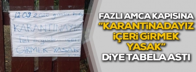 "Karantinadayız eve girmek yasak" diye kapıya tabela astı