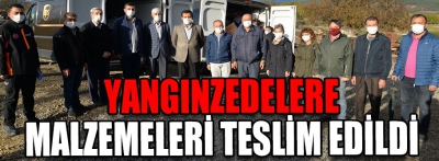 Yangınzedelere malzemeleri teslim edildi