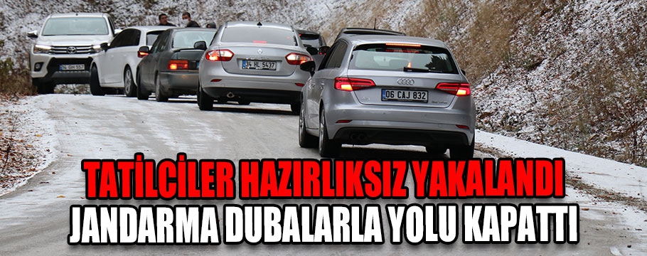 Jandarma dubalarla yolu kapattı