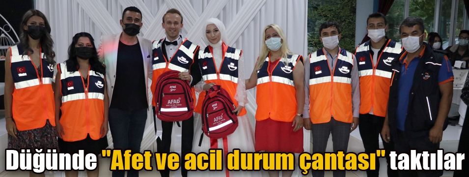 AFAD gönüllüsü gelin ve damadın takısı 
