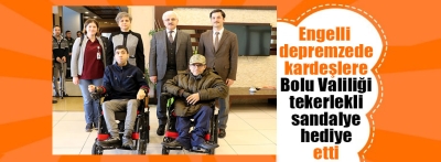 Valilikden engelli depremzede kardeşlere akülü tekerlekli sandalye