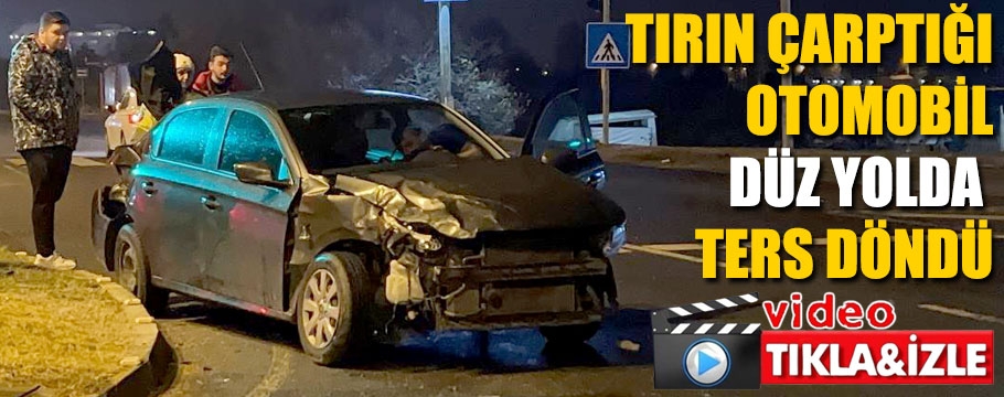 Kırmızı ışıkta geçen tır, otomobili yolda ters döndürdü