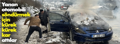 Araç yangınına karla müdahale ettiler