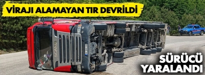 Virajı  alamayan tır devrildi: 1 yaralı